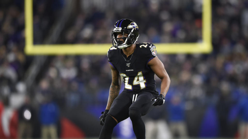 Baltimore Ravens cornerback Marcus Peters falls back in coverage against the New York Jets during the second half of an NFL football game, Thursday, Dec. 12, 2019, in Baltimore. (AP Photo/Gail Burton)