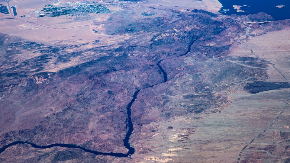 The Colorado River flows south from Hoover Dam and Lake Mead as viewed from a commercial flight on September 1, 2023, near Boulder City, Nevada. - George Rose/Getty Images/File