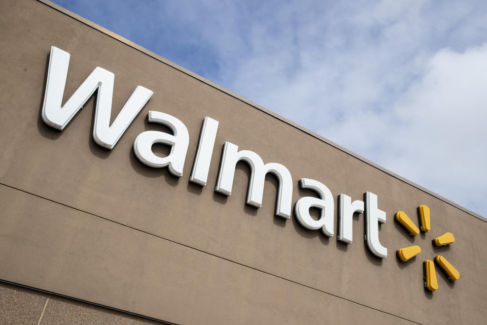 FILE - This Tuesday, March 17, 2020 file photo shows a Walmart in Warrington, Pa. A growing number of U.S. companies are pledging to give workers time off to vote in the presidential election this November, an effort that’s gaining steam despite the government’s reluctance to make Election Day a federal holiday. Walmart says it will give its 1.5 million U.S. workers up to three hours paid time off to vote.(AP Photo/Matt Rourke, File)