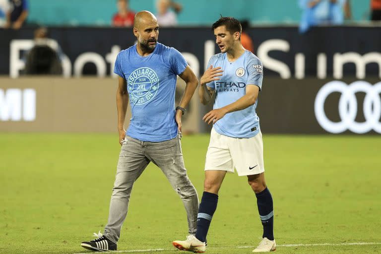 Benjamín Garré y Josep Pep Guardiola