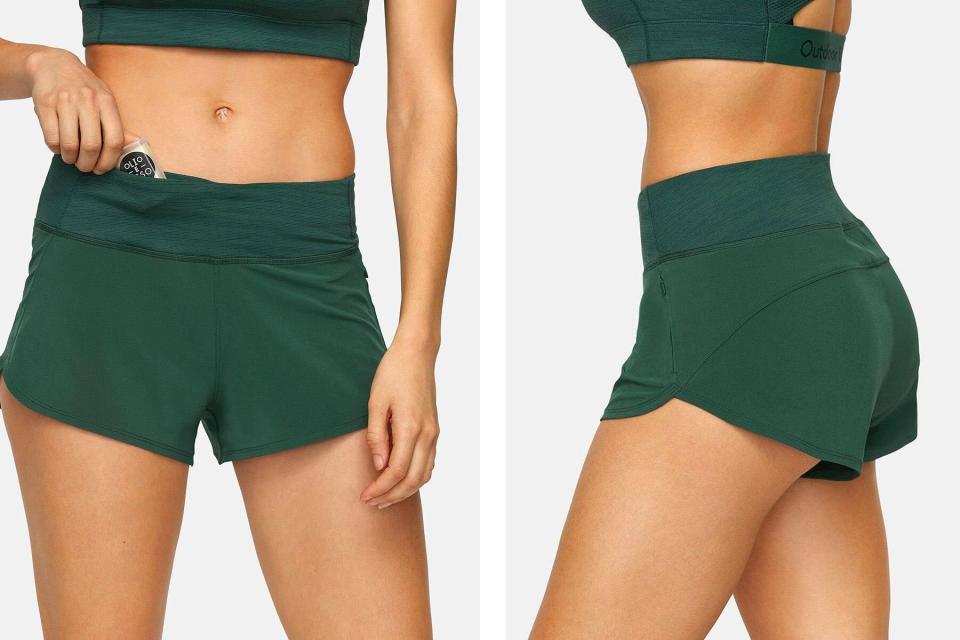 Woman wearing green running shorts