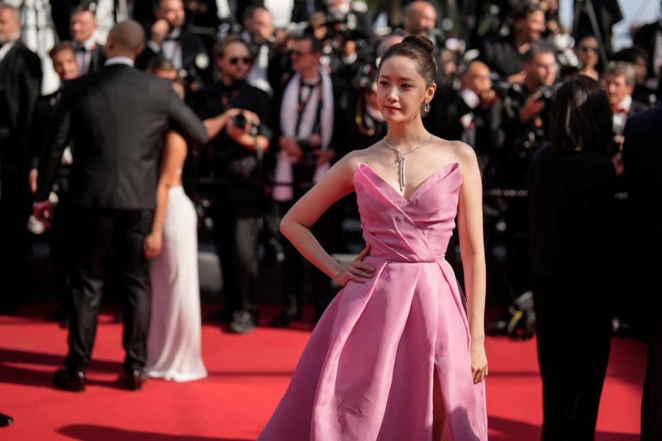 An unidentified female security has been criticized for her treatment of Korean actor Im Yoon-ah (pictured) on the red carpet at Cannes (Andreea Alexandru/Invision/AP)