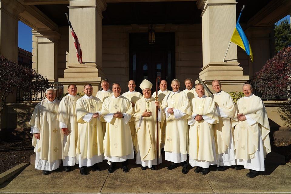 Pictured following the Ordination Mass are, front row, from left: Rev. John V. Polednak, V.E., Episcopal Vicar for Clergy; Deacon Walter Janoski, Coordinator of the Candidate Advisor and Pastoral Formation Programs; Deacon Matthew R. Eisley, Jersey Shore; Deacon Nicholas M. Rocco, Jefferson Township; Bishop Bambera; Deacon John F. Bubb, Montoursville; Deacon John F. Bankus, Wyoming; Rev. Gerald W. Shantillo, V.G., S.T.L., Vicar General and Moderator of the Curia; Monsignor David Bohr, Diocesan Secretary for Clergy Formation and Director of the Permanent Diaconate Formation Program. Back row, from left: Deacon Thomas A. Kostic, Hazleton; Deacon Martin J. Castaldi, Scranton; Deacon Steven J. Miller, Tannersville; and Deacon Frank H. Zeranski, Jefferson Township.