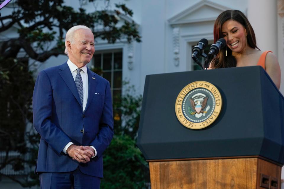 President Joe Biden listens as Eva Longoria speaks before a screening of the film "Flamin' Hot" on June 15, 2023, on the South Lawn of the White House in Washington.