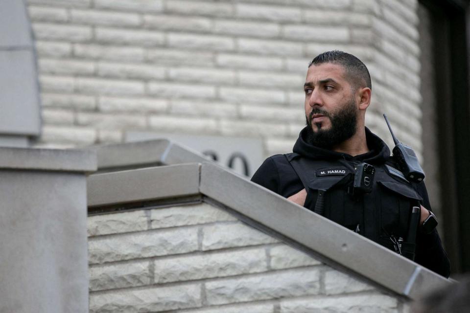 PHOTO: Armed security overlooks a press conference at Mosque Foundation where mourners attend a funeral prayer for Wadea Al-Fayoume, 6, a Muslim boy who was stabbed to death in Bridgeview, Ill., Oct. 16, 2023. (Jim Vondruska/Reuters, FILE)