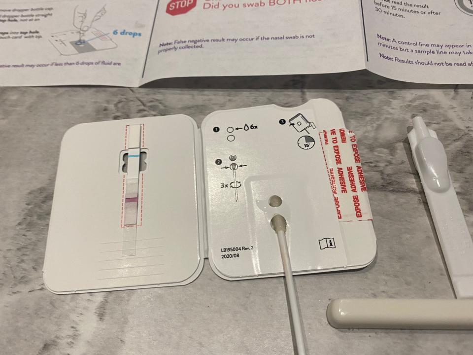 covid test swab in card