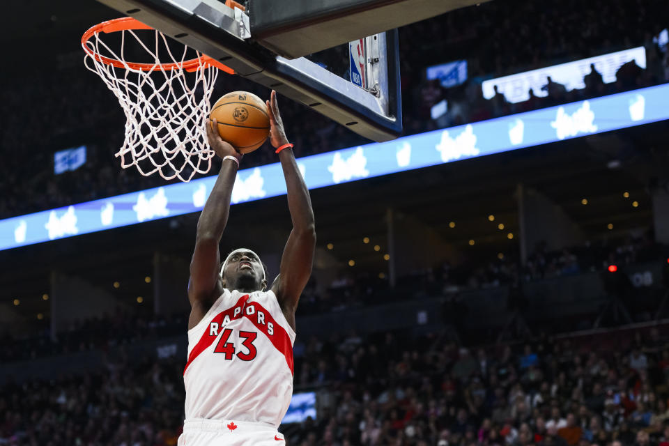 Toronto Raptors forward Pascal Siakam scores against the Washington Wizards during second-half NBA basketball game action in Toronto, Monday, Nov. 13, 2023. (Christopher Katsarov/The Canadian Press via AP)