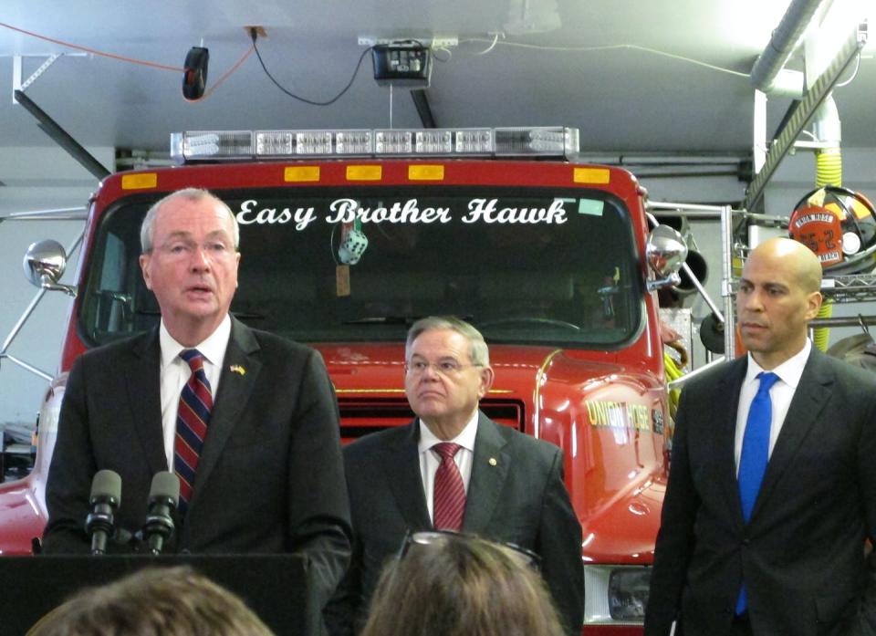 New Jersey Gov. Phil Murphy, left, seen here in 2018 with Robert Menendez and fellow New Jersey Democratic Sen. Cory Booker, has called on Menendez to resign. <a href="https://newsroom.ap.org/detail/SuperstormSandyRebuildingAid/b3ee03a1ac9644d8add820dee6f3a57d/photo?Query=Phil%20Murphy%20Robert%20Menendez&mediaType=photo&sortBy=arrivaldatetime:desc&dateRange=Anytime&totalCount=3&currentItemNo=2" rel="nofollow noopener" target="_blank" data-ylk="slk:AP Photo/Wayne Parry;elm:context_link;itc:0;sec:content-canvas" class="link ">AP Photo/Wayne Parry</a>