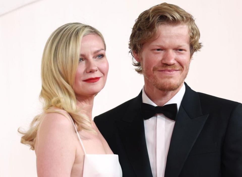 Kirsten Dunst and Jesse Plemon arrive at the 96th Academy Awards.