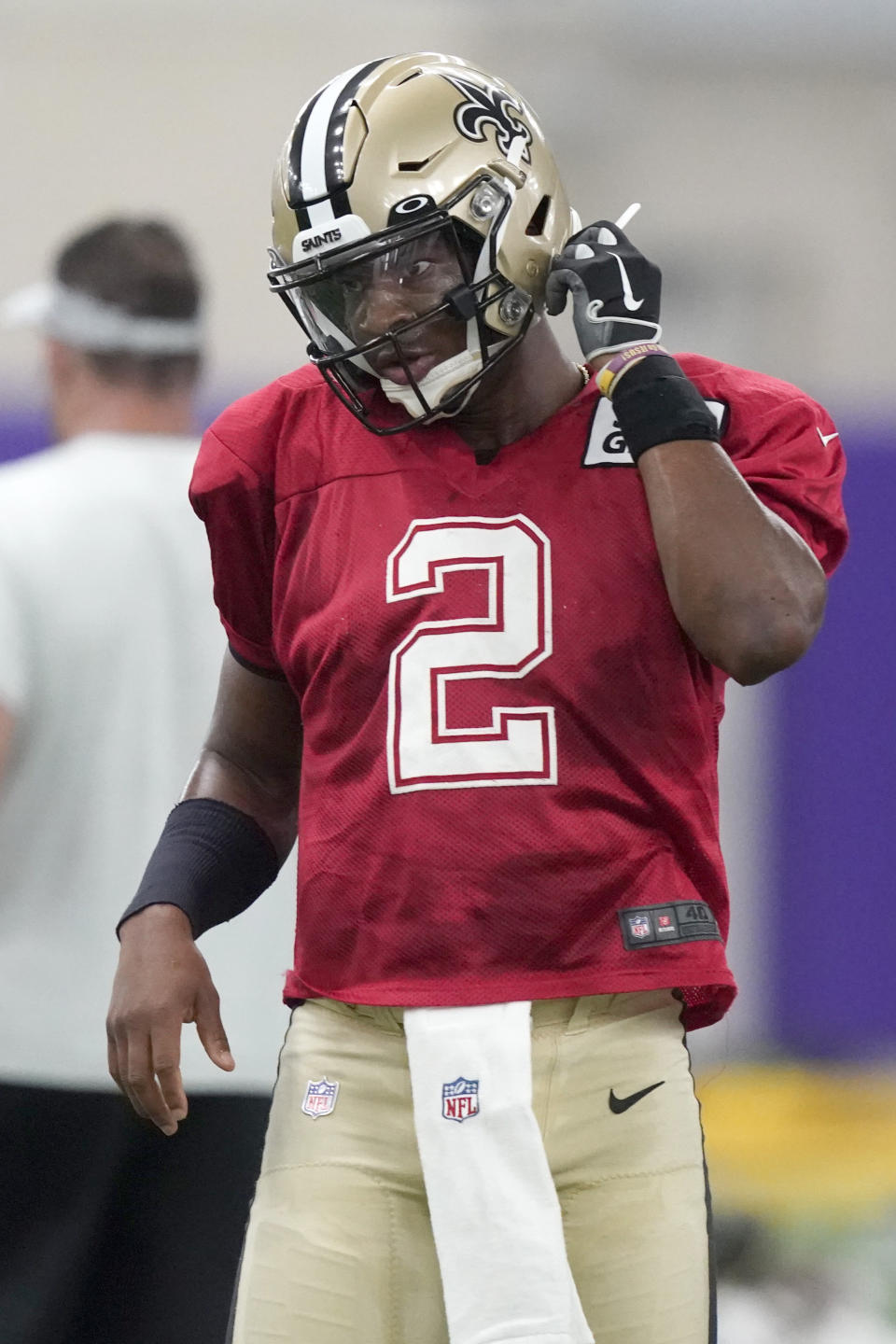 New Orleans Saints quarterback Jameis Winston (2) adjusts his helmet during NFL football practice in Fort Worth, Texas, Wednesday, Sept. 15, 2021. (AP Photo/LM Otero)