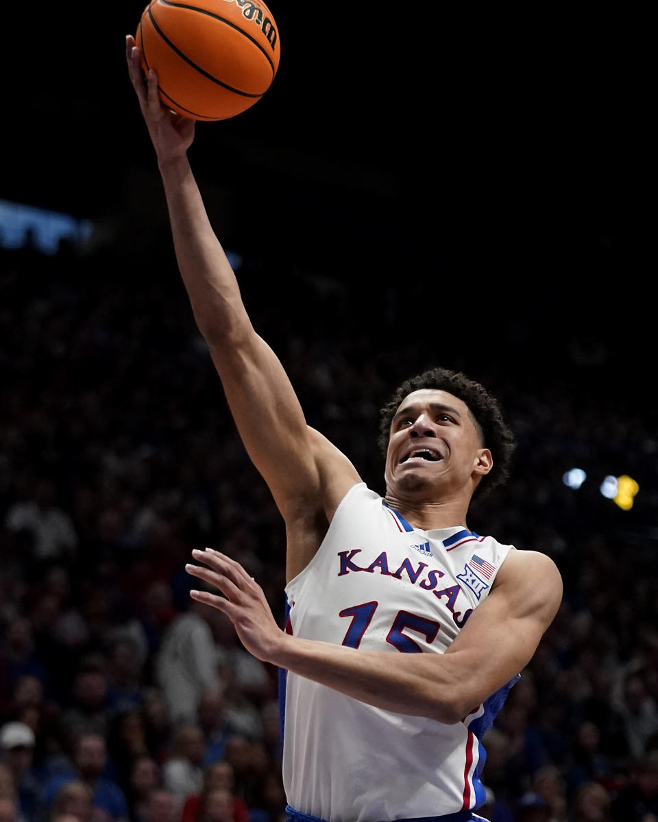 Kansas guard Kevin McCullar Jr. puts up a shot during the first half of an NCAA college basketball game against Missouri Saturday, Dec. 9, 2023, in Lawrence, Kan. (AP Photo/Charlie Riedel)