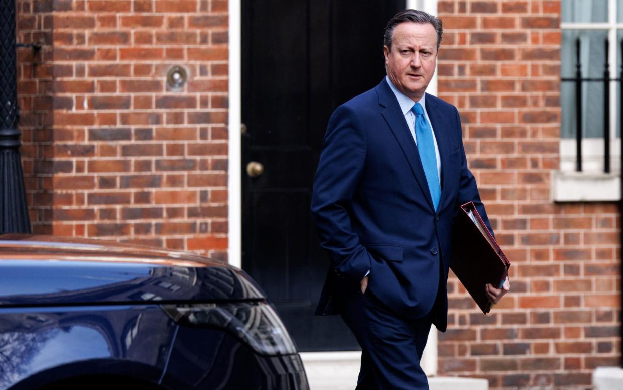 Lord Cameron, the Foreign Secretary, is pictured today in Downing Street