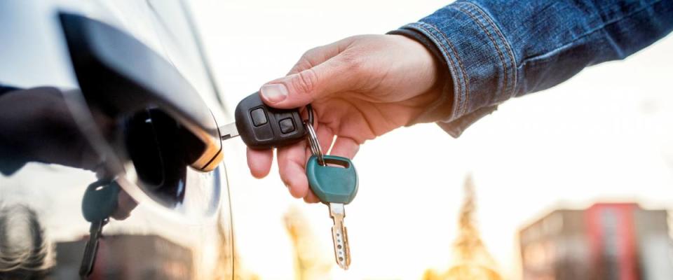 Woman with car key