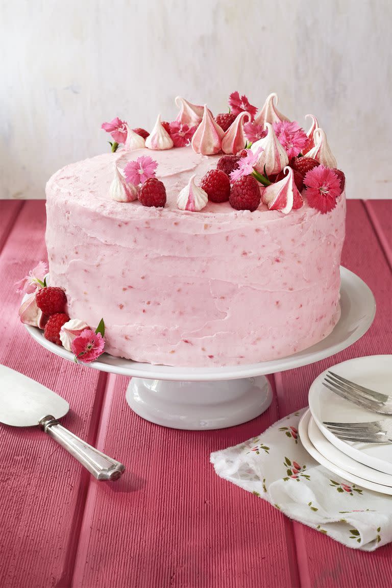 <p>Top this breathtaking cake with fluffy, colored meringues and edible flowers and you have the best, most delicious dinner centerpiece you (and your valentine) could want. </p><p><em>Get the recipe at <a href="https://www.countryliving.com/food-drinks/recipes/a41986/raspberry-pink-velvet-cake-recipe/" rel="nofollow noopener" target="_blank" data-ylk="slk:Country Living;elm:context_link;itc:0;sec:content-canvas" class="link ">Country Living</a>.</em></p>