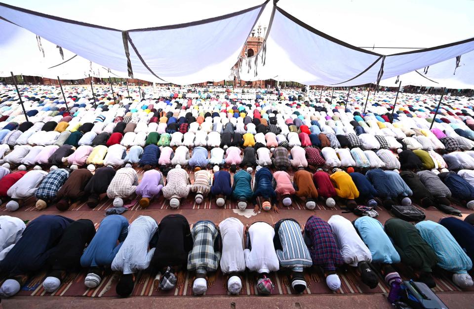 Muslims pray during the last Friday of the holy fasting month of Ramadan at the Jama Masjid mosque in the old quarters of New Delhi on April 21, 2023.