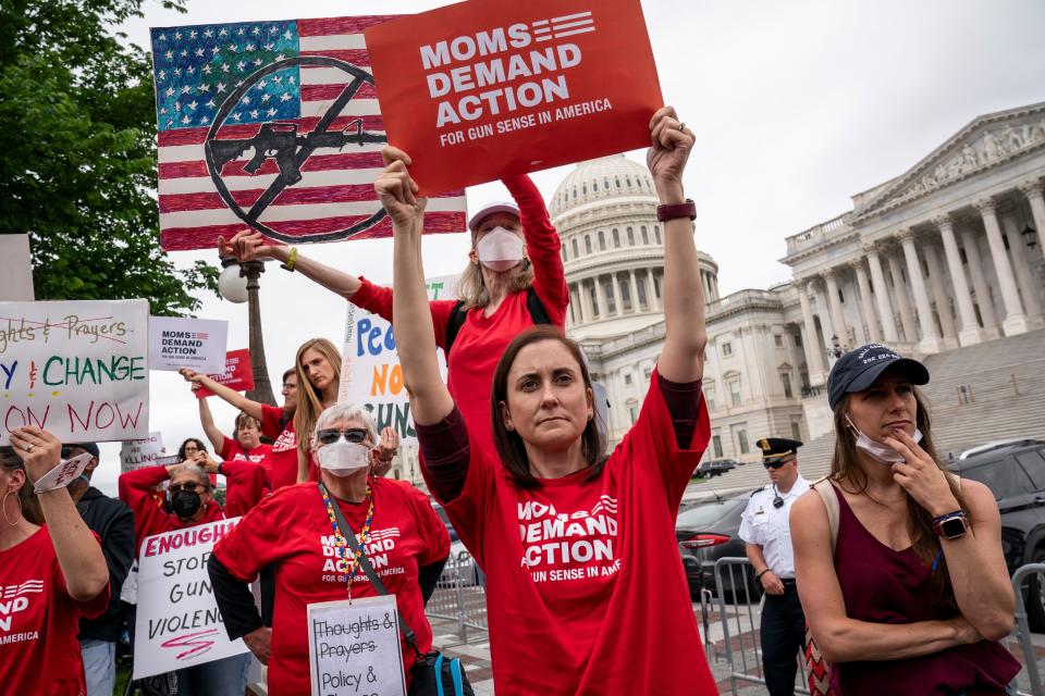 Activists join Senate Democrats outside the Capitol to demand action on gun control legislation after a gunman killed 19 children and two teachers in a Texas elementary school (AP)