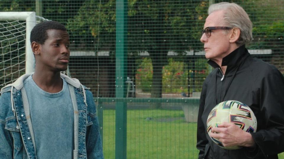Vinny (Micheal Ward) and Coach Mal (Bill Nighy) in Netflix's "The Beautiful Game" 