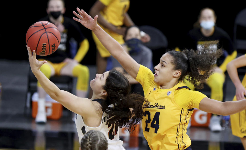 Oregon State guard Talia Von Oelhoffen (22) shoots as California forward Evelien Lutje Schipholt (24) defends during an NCAA college basketball game in the first round of the Pac-12 women's tournament Wednesday, March 3, 2021, in Las Vegas. (AP Photo/Isaac Brekken)
