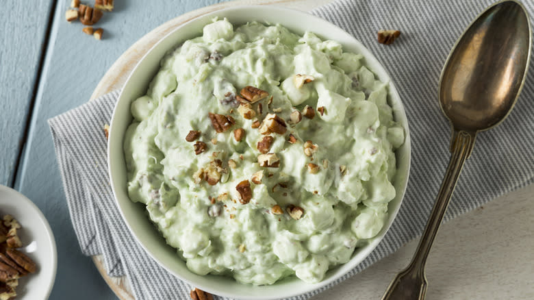 Watergate salad with nuts in bowl