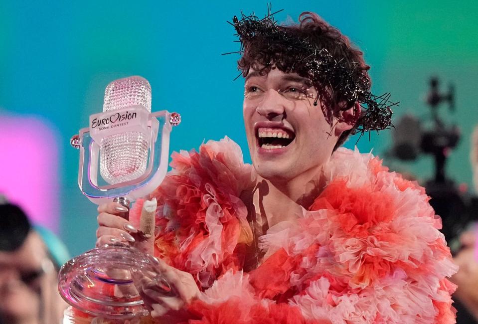 Swiss contestant Nemo with their Eurovision 2024 trophy (AP)