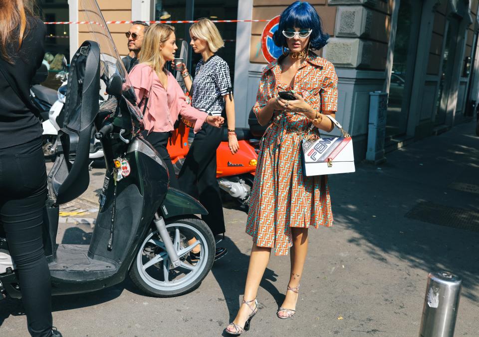 The best beauty looks—think sharp-as-a-knife center parts and electric bobs—from Phil Oh’s street style darlings at Milan Fashion Week.