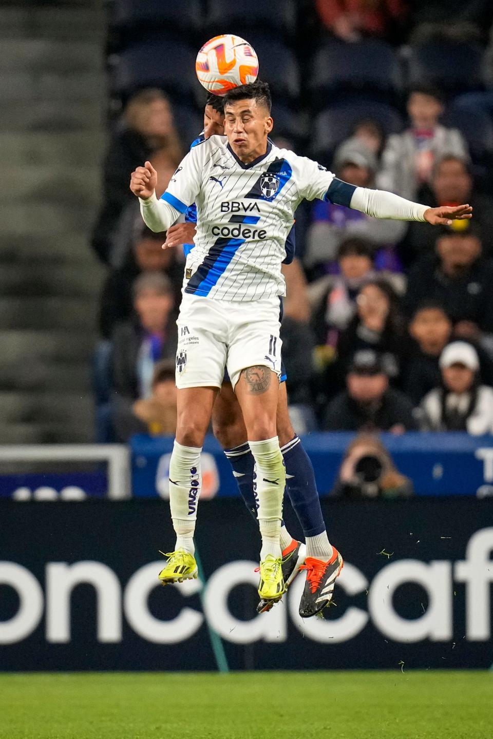 Monterrey midfielder Maximiliano Meza (11) leaps for a header in the second half of the CONCACAF Champions Cup Round of 16 game between the FC Cincinnati and the Monterrey at TQL Stadium in Cincinnati on Thursday, March 7, 2024. Monterrey carried a halftime lead to a 1-0 victory.