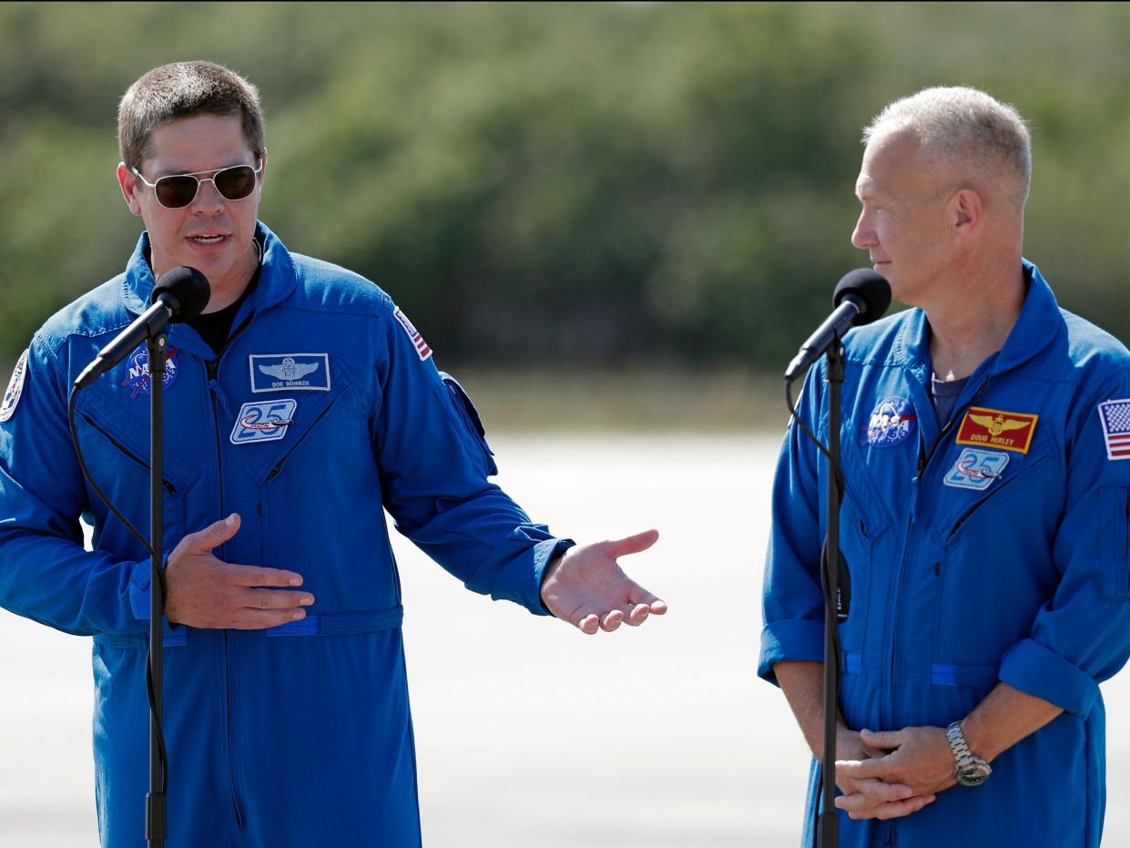 NASA astronauts Robert Behnken, left, and Doug Hurley speak during a news conference in Cape Canaveral, FL, May 20, 2020. (AP Photo:John Raoux)