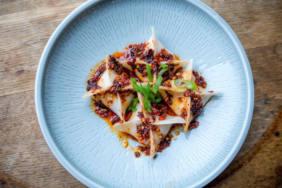 Shrimp dumplings with Korean chili crisp sauce on the menu at Nami, a Korean steakhouse.