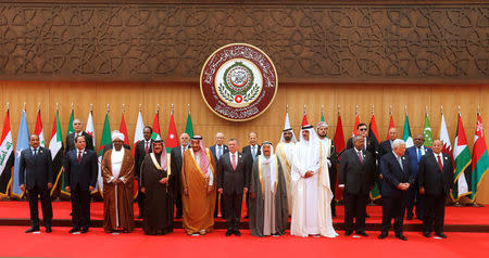 (front R-L) Yemen's President Abd-Rabbu Mansour Hadi, Palestinian President Mahmoud Abbas, Djibouti's President Ismail Omar Guelleh, Qatari Emir Sheikh Tamim bin Hamad al-Thani, Emir of Kuwait Sabah Al-Ahmad Al-Jaber Al-Sabah, Jordan's King Abdullah II, Saudi Arabia's King Salman bin Abdulaziz Al Saud, Bahrain's King Hamad bin Isa Al Khalifa, Sudan's President Omar Al Bashir, Egypt's President Abdel Fattah al-Sisi, and Mauritania's President Mohamed Ould Abdel Aziz pose for a group photograph during the 28th Ordinary Summit of the Arab League at the Dead Sea, Jordan March 29, 2017. REUTERS/Mohammad Hamed