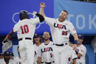 United States' Nick Allen celebrates with Todd Frazier after hitting a home run in the fifth inning of a baseball game against South Korea at the 2020 Summer Olympics, Saturday, July 31, 2021, in Yokohama, Japan. (AP Photo/Sue Ogrocki)