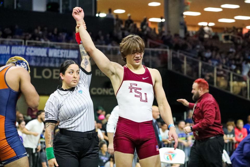 Florida High's Xander Hawkes, Lincolns Ryder Luck make area wrestling history by winning individual state championships at Osceola High School in Kissimmee on Saturday, March 2, 2024.