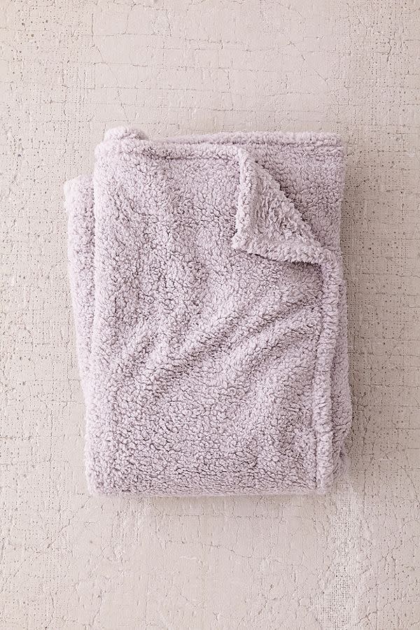 <p>$49</p><p><a class="link " href="https://www.urbanoutfitters.com/shop/amped-fleece-throw-blanket" rel="nofollow noopener" target="_blank" data-ylk="slk:SHOP NOW;elm:context_link;itc:0;sec:content-canvas">SHOP NOW</a></p><p>Maybe, if you're lucky, she'll put this comfy throw in the guest bedroom so <em>you</em> can snuggle with it when you visit. <br></p>