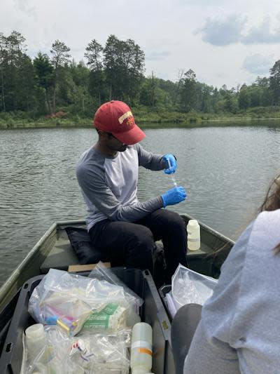 Postdoc researcher Sajjad Akam collects a water sample for chemical analysis back in the lab. Elizabeth Swanner, <a href="http://creativecommons.org/licenses/by-nd/4.0/" rel="nofollow noopener" target="_blank" data-ylk="slk:CC BY-ND;elm:context_link;itc:0;sec:content-canvas" class="link ">CC BY-ND</a>