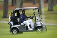 North Carolina A&T's J.R. Smith looks at his ball while driving a cart during the first round of the Phoenix Invitational golf tournament in Burlington, N.C., Monday, Oct. 11, 2021. Smith, who spent 16 years in the NBA made his college golfing debut in the tournament hosted by Elon. (AP Photo/Gerry Broome)