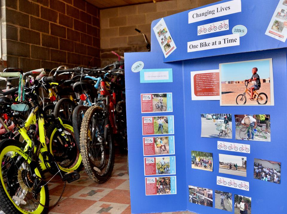 A display about Bikes for the World alongside several of the bikes Otterbein United Methodist Church's collection efforts have so far this year for the international charity.