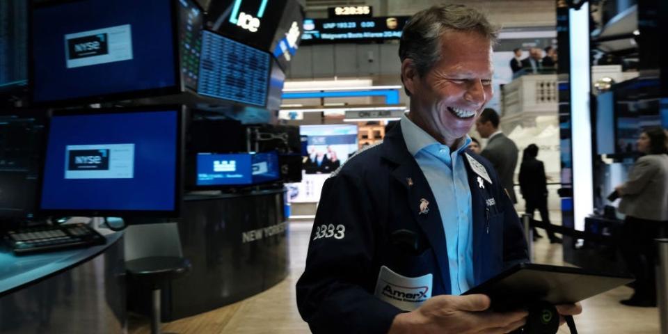 Traders work on the floor of the New York Stock Exchange (NYSE) on March 28, 2023 in New York City.