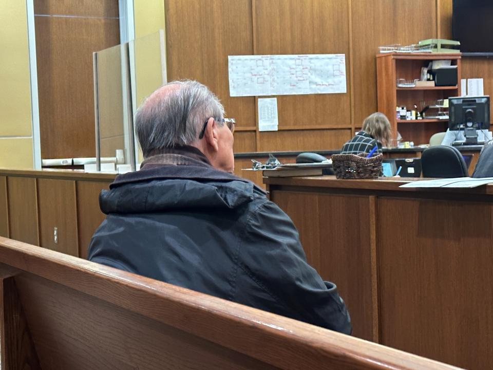 Shi Ying Kuai sits in district courtroom 3B of the Buncombe County Courthouse during his court appearance Oct. 18, 2023. Kuai currently faces three counts of misdemeanor sexual battery and one felony count of second-degree forcible sex offense.