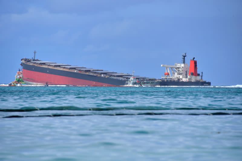 A general view shows the bulk carrier ship MV Wakashio, belonging to a Japanese company but Panamanian-flagged, that ran aground on a reef, at Riviere des Creoles