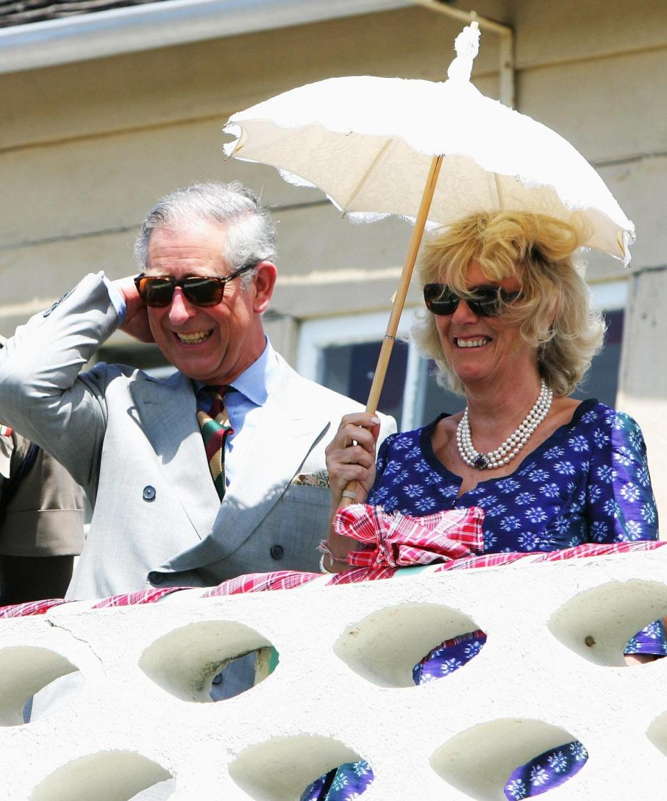 Prince Charles and Camilla watch a band at the Jamaican Defence Force Infantry Officer's Mess on March 10, 2008 in Kingston, Jamaica (Getty Images)