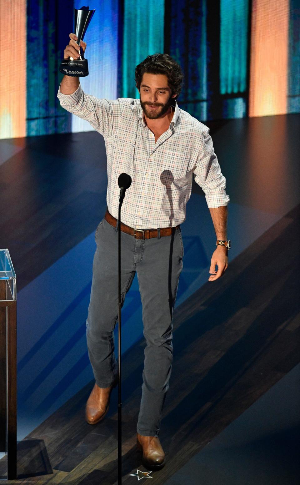 Thomas Rhett accepts the award for Entertainer of the Year. Rhett and Carrie Underwood tied for the Entertainer of the Year Award.