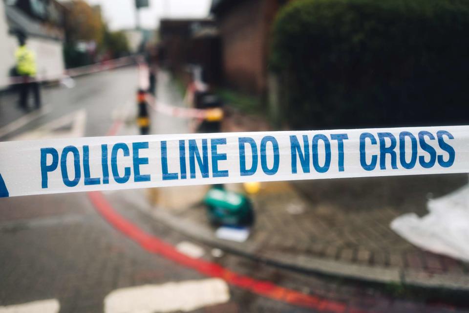 <p>Getty</p> A stock image of police tape