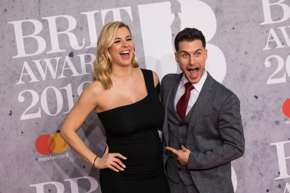 Gemma Atkinson and Gorka Marquez pose for photographers upon arrival at the Brit Awards in London, Wednesday, Feb. 20, 2019. (Photo by Vianney Le Caer/Invision/AP)