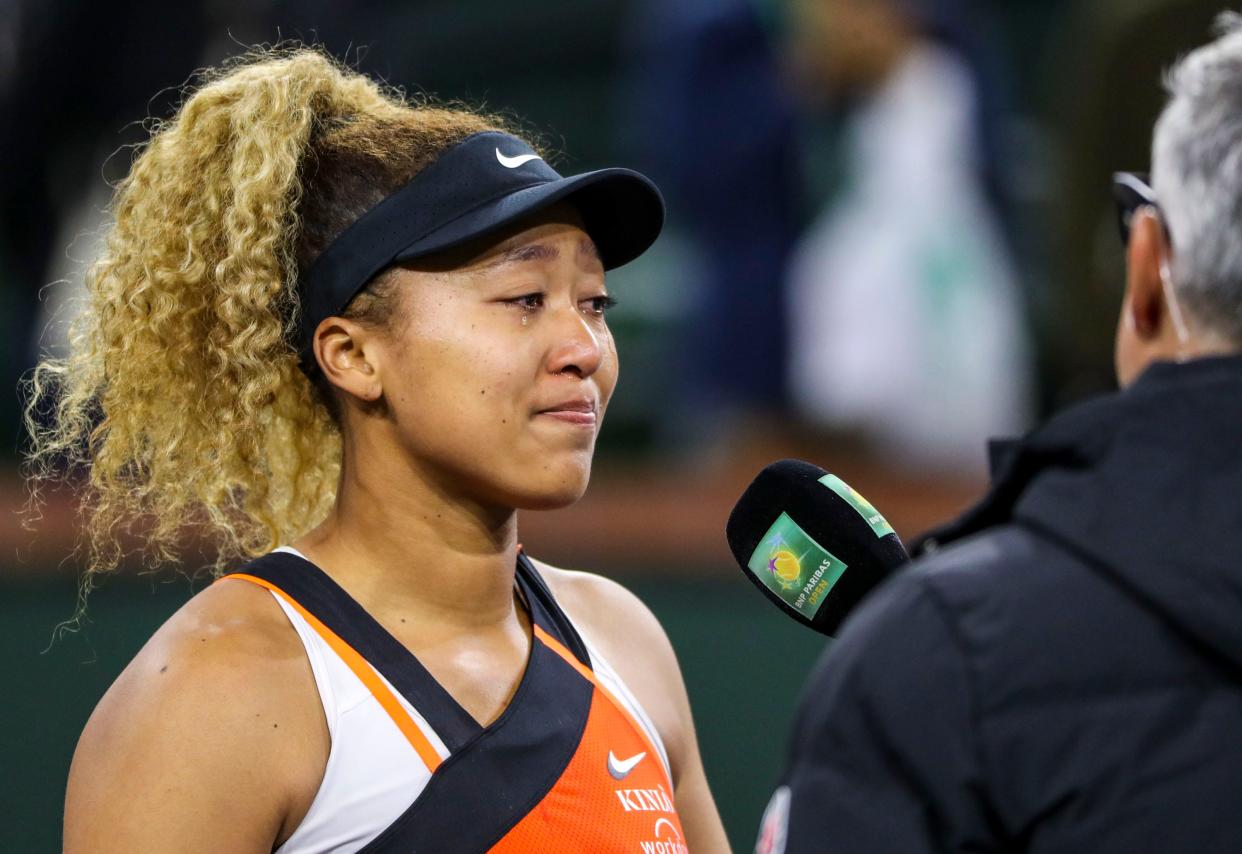 Naomi Osaka speaks to the crowd after being heckled during a March 12 match.