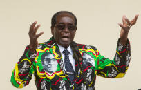 <p>Mugabe addresses people at an event during his party’s 16th Annual Peoples Conference in Masvingo, Zimbabwe, in December 2016. (Photo: Tsvangirayi Mukwazhi/AP) </p>