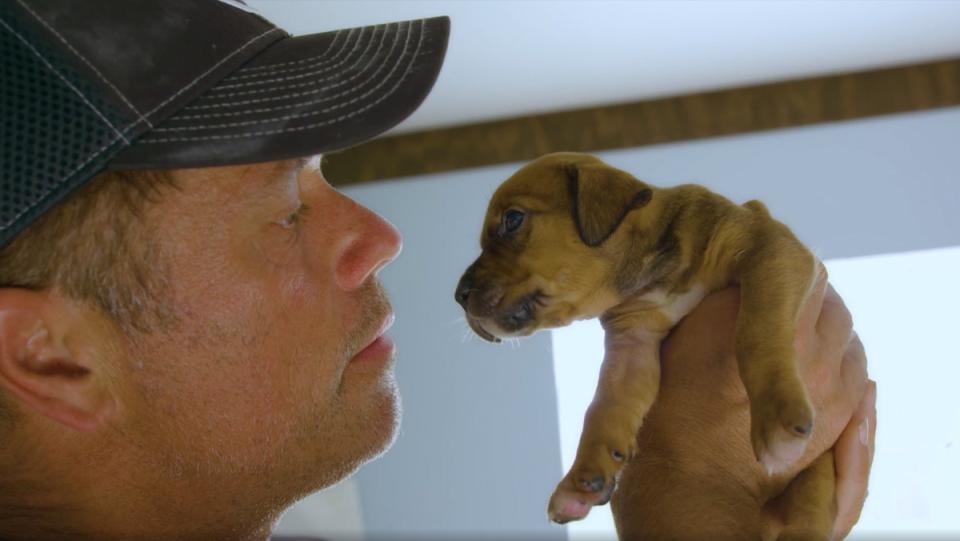 Doug Thron creator of drone animal rescue technology with puppy