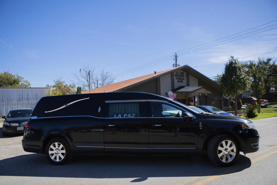 A funeral hearse carrying the casket of Brianna Rodriguez exits La Paz Memorial Funeral Home after Rodriguez's funeral, Saturday, Nov. 13, 2021, in Houston. Rodriguez died from injuries sustained during a stampede at the Astroworld music festival. (Marie D. De Jesús/Houston Chronicle via AP)