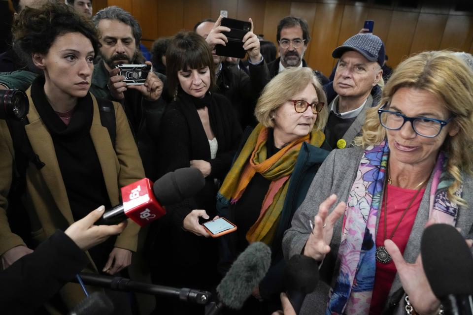 Claudio Regeni and his wife Paola leave the court at the end of the trial for the killing of Cambridge University researcher Giulio Regeni, at the Rome's court, Tuesday, Feb. 20, 2024. Four high-level Egyptian security officials are going on trial in absentia in a Rome court, accused in the 2016 abduction, torture and slaying of an Italian doctoral student in Cairo. At right is Regeni family attorney Alessandra Ballarini. (AP Photo/Andrew Medichini)