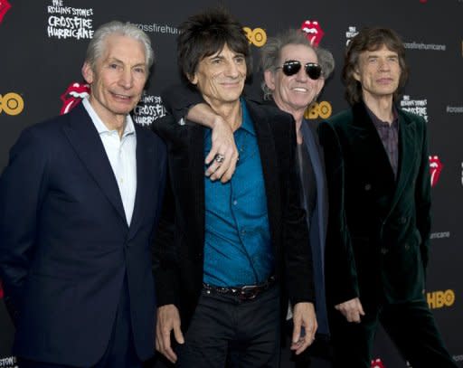 (L to R) Charlie Watts, Ronnie Wood, Keith Richards and Mick Jagger of the Rolling Stones in New York on November 13. The four were joined by their original bass player Bill Wyman in London on November 25 as the ageing rockers performed their first major concert for five years