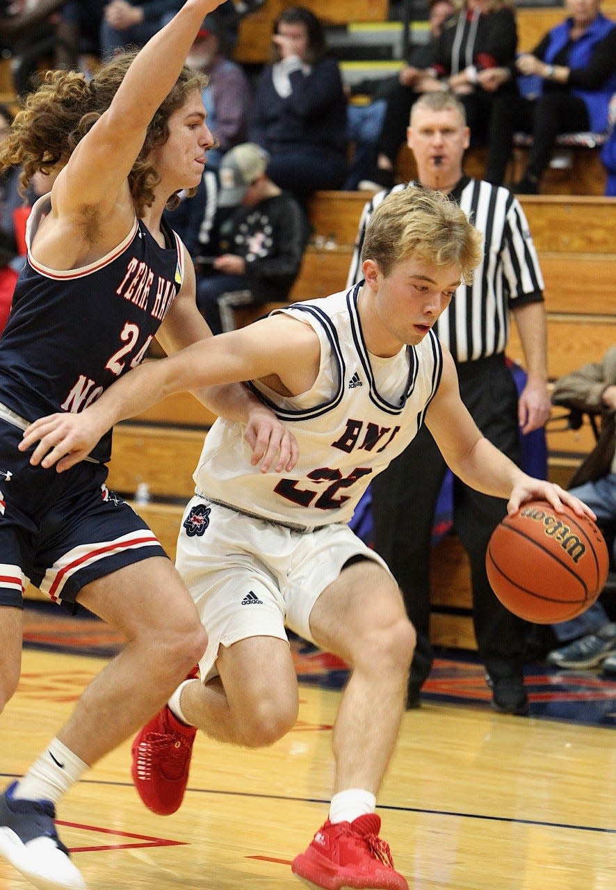 BNL's Colton Staggs dribbles against Terre Haute North's Damon Sturm Saturday night.