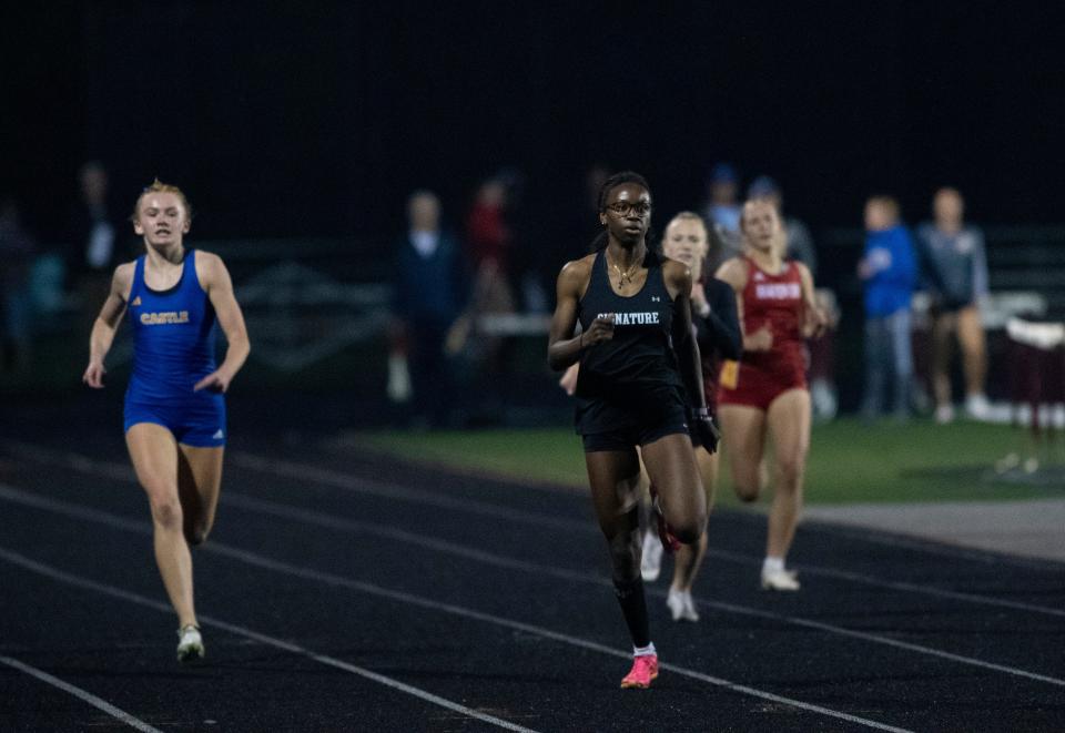 Runners compete in the 400 meter run during the 2024 IHSAA Girls Track & Field Sectional 32 at Mt. Vernon High School Tuesday, May 14, 2024.